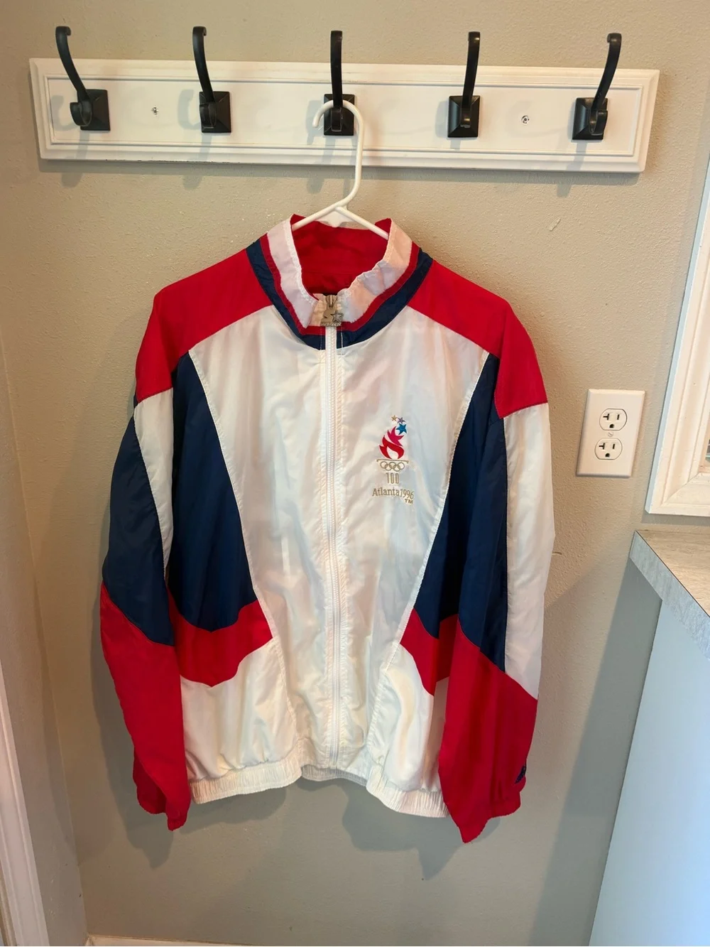 Vintage STARTER Atlanta 1996 Olympic Games White, Red & Navy Men’s windbreaker.